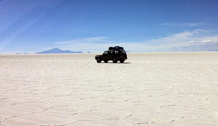 4x4 driving along the salt flats of Uyuni Bolivia