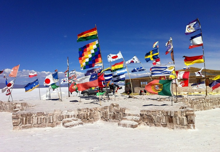 Flags left by travellers passing by the Uyuni Salt Flats